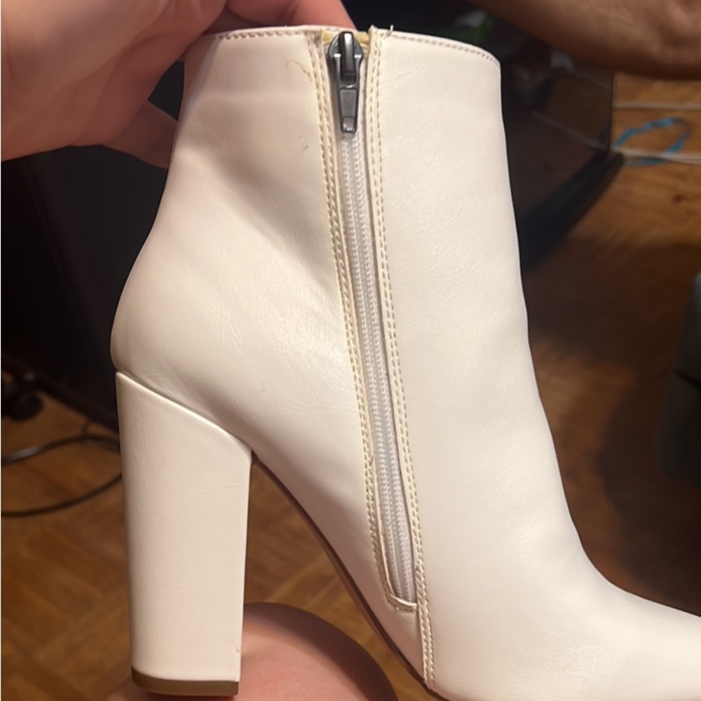 White Womans bootie heels, never worn, brand new